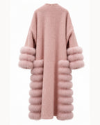 A dusty pink teddy coat with luxurious faux fur trim on the sleeves and hem, shown from the back against a plain white background.