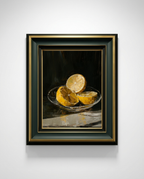 A framed still life painting of sliced lemons in a glass bowl, set against a dark background. The artwork is housed in a decorative frame with a black outer border, gold inner trim, and a dark green mat, shown hanging on a light gray wall.