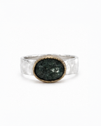 Silver ring with green stone 