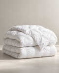 The Cairngorm Down Duvet in white, folded