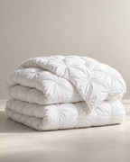 The Cairngorm Down Duvet in white, folded