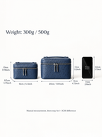Two navy blue textured cosmetic cases shown with dimension labels and weight text on a white background, alongside a smartphone for scale.