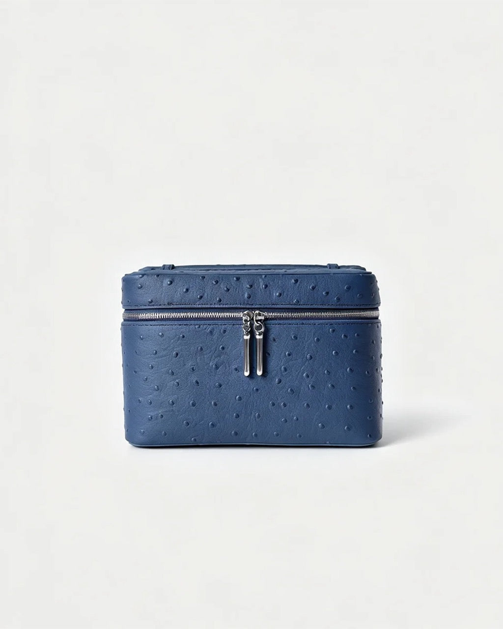 A blue ostrich-textured leather zippered cosmetic case with silver-tone hardware, centered on a clean white background.