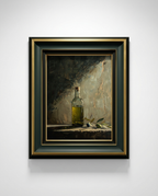 Framed still life wall art showing a glass bottle with green oil and olives on a dark textured background, presented in a black frame with gold inner trim and a dark green outer border.