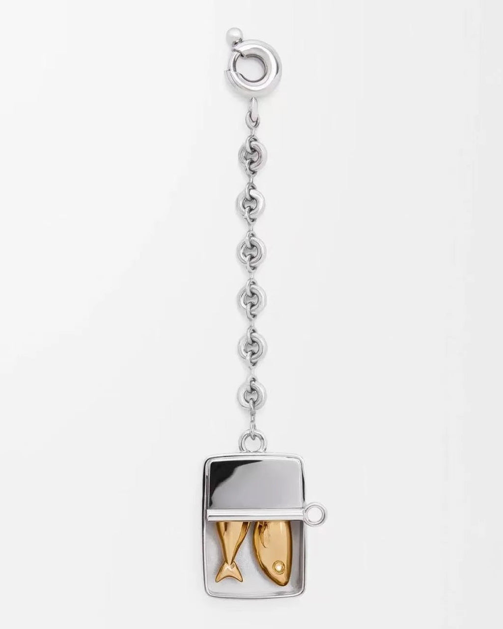 A silver-toned pendant necklace featuring a rectangular fish-shaped charm with two gold-toned fish inside, suspended from a delicate silver chain with a lobster clasp, shown on a plain white background.