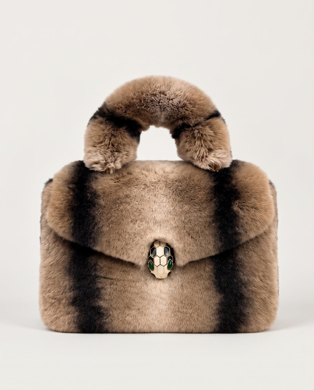 A structured faux fur handbag with a rounded top handle, featuring alternating vertical stripes of light brown, black, and beige, and a snake-head clasp at the center.