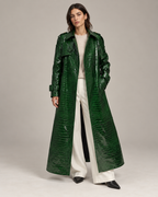 Model wearing The Riviera Leather Trench open over a cream jumper and white trousers
