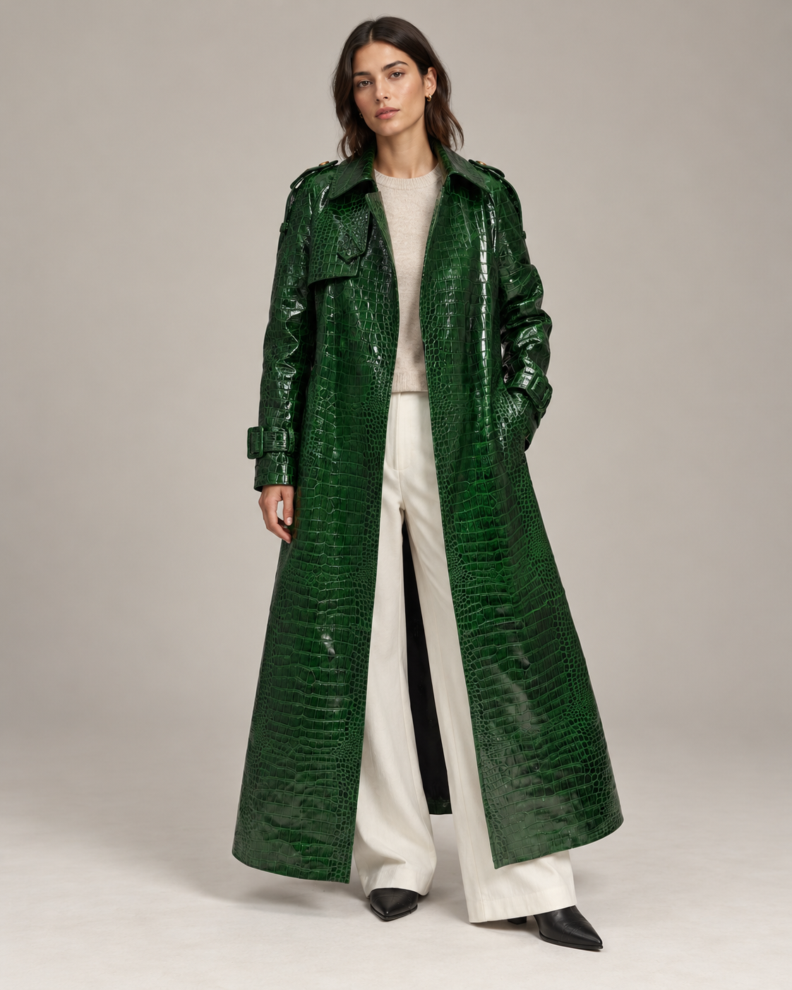 Model wearing The Riviera Leather Trench open over a cream jumper and white trousers