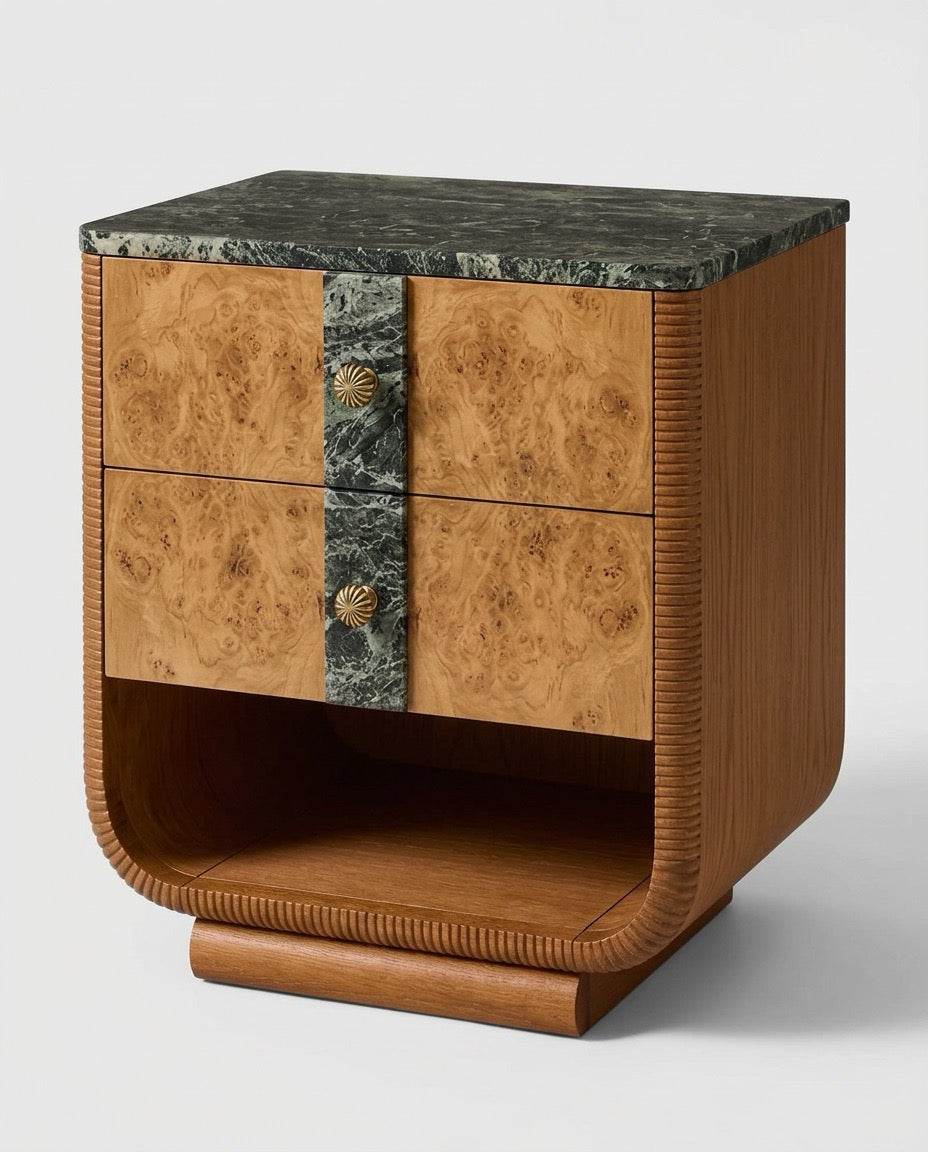 Art Deco style nightstand featuring a curved wood body, burl wood drawer fronts, a central dark green marble vertical panel with shell-shaped brass knobs, and a dark green marble top, shown on a light gray background.
