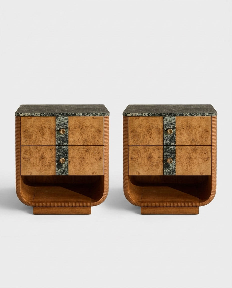 A pair of mid-century modern nightstands with curved burl wood fronts, dark green marble top and base, and bronze metal drawer pulls, shown on a light gray background.
