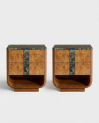 A pair of mid-century modern nightstands with curved burl wood fronts, dark green marble top and base, and bronze metal drawer pulls, shown on a light gray background.