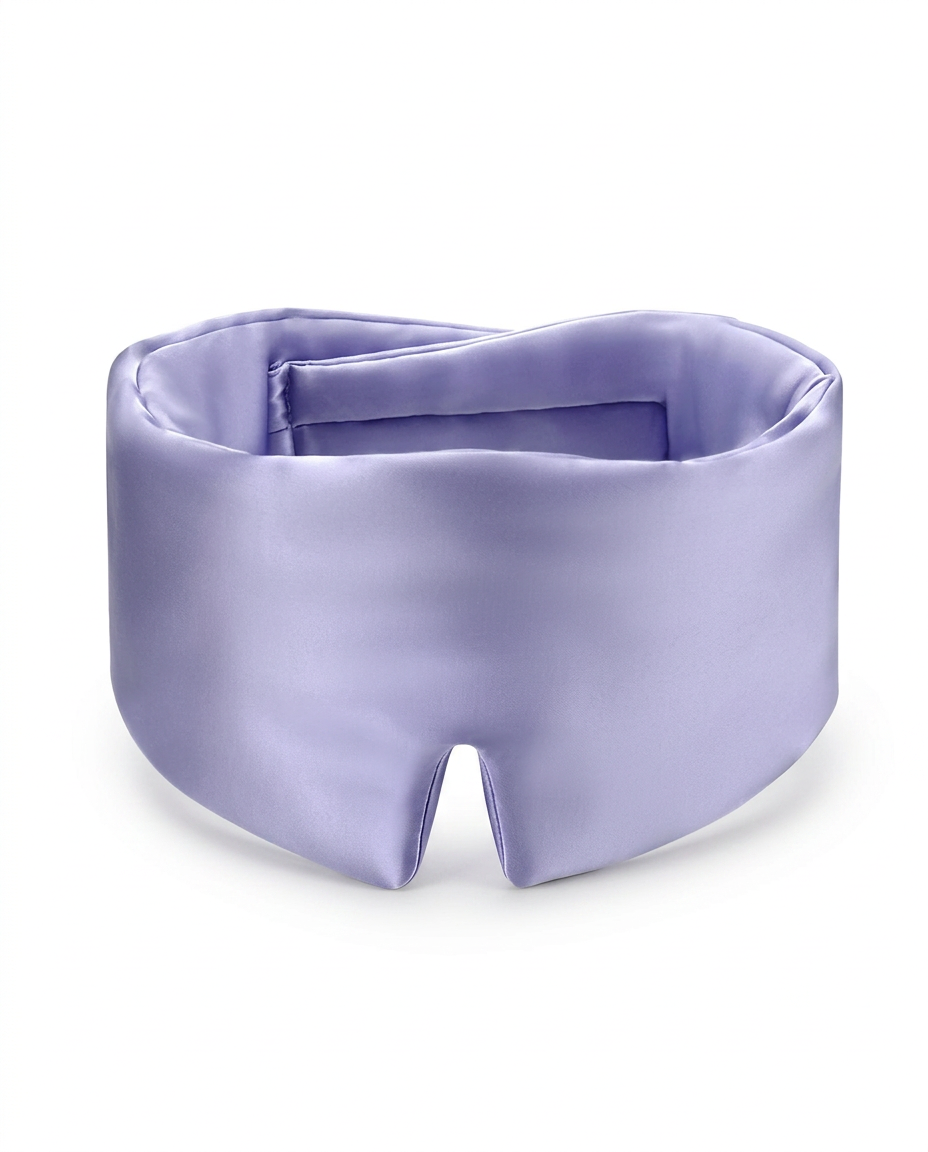 A lavender purple satin sleep mask with a smooth, lustrous finish, photographed on a clean white background.