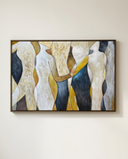 A framed abstract wall art print featuring stylized human silhouettes in cream, beige, mustard yellow, and dark navy tones, hung on a light beige wall.