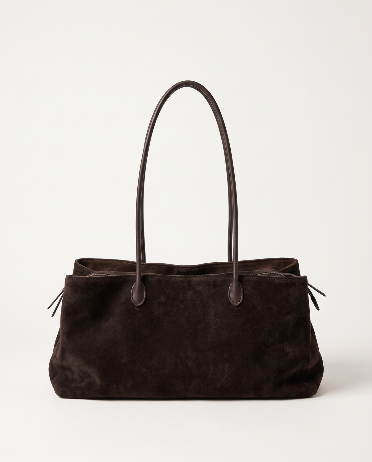 The Marais Tote in Dark Coffee suede, front view with long leather handles