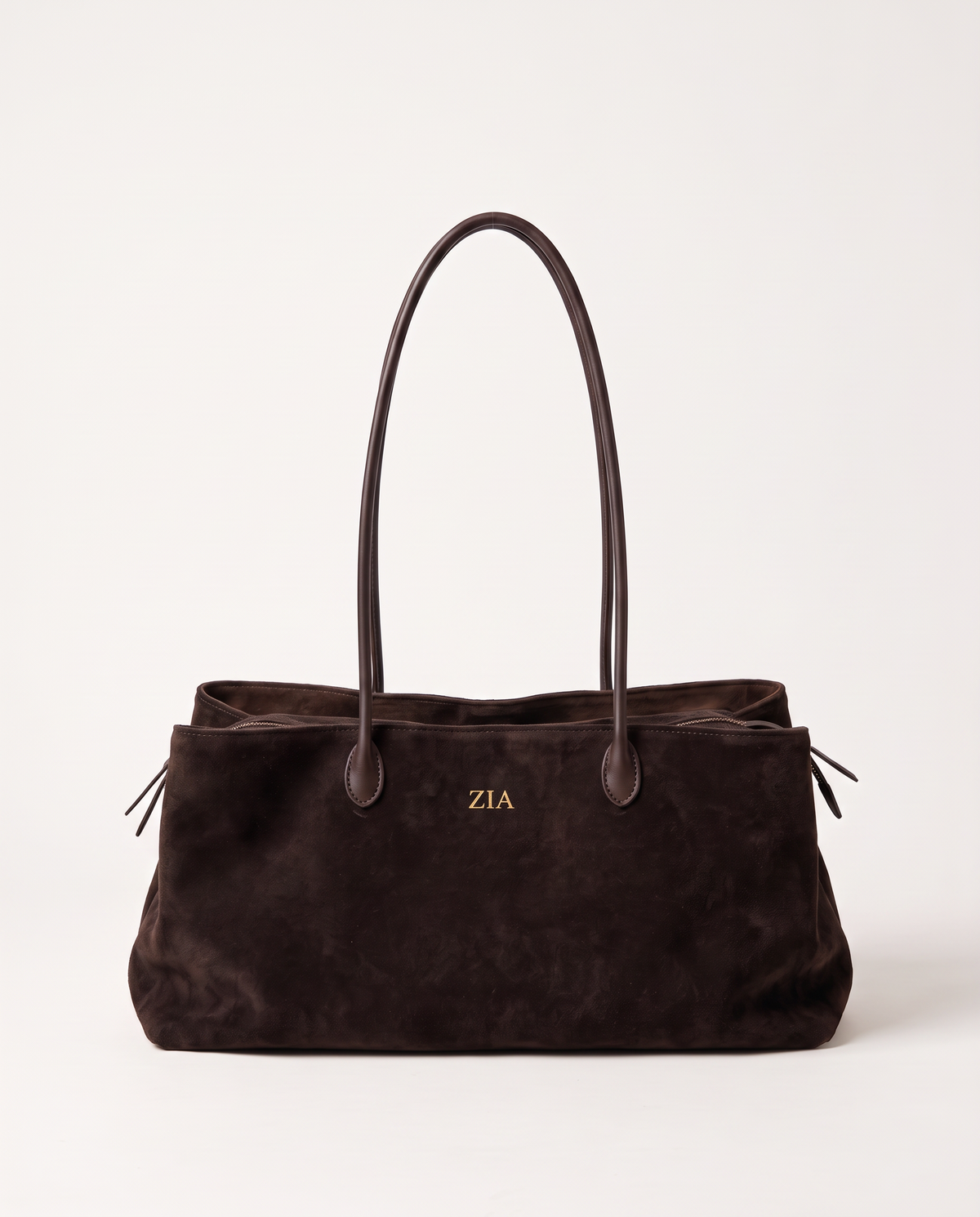 The Marais Tote in Dark Coffee suede, personalised with the initials ZIA embossed in gold