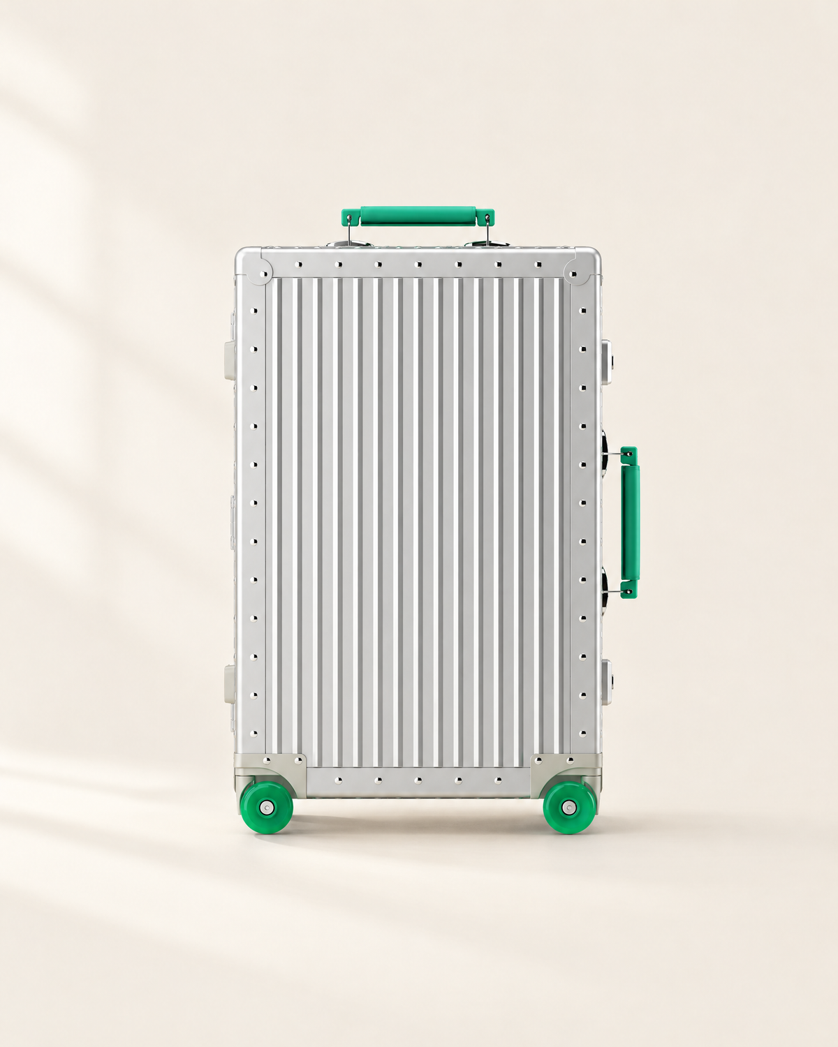 The Meridian Suitcase in silver with green