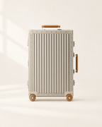 The Meridian Suitcase in gold with brown