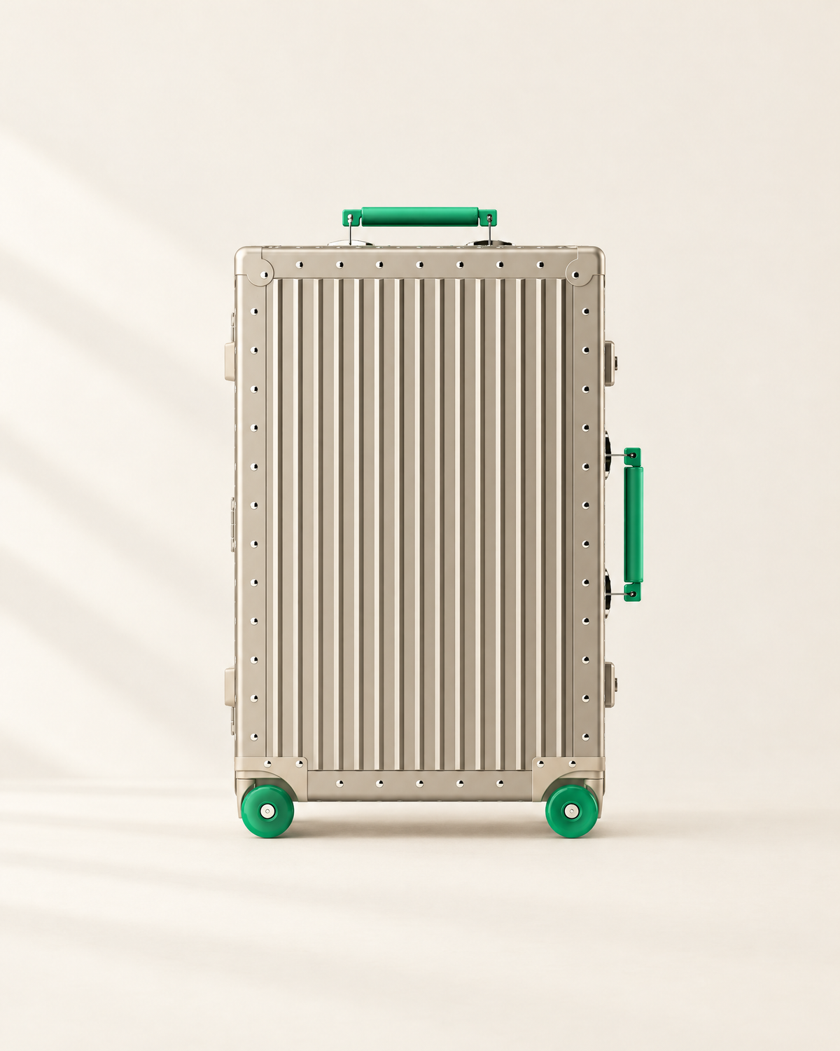 The Meridian Suitcase in gold with green