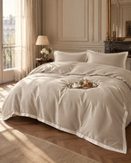 The Lyon Silk Bedding Set in oyster with ivory border, morning in Paris