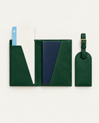 The Grand Voyage Travel Set in Cross-grain Green, open with passport and ticket