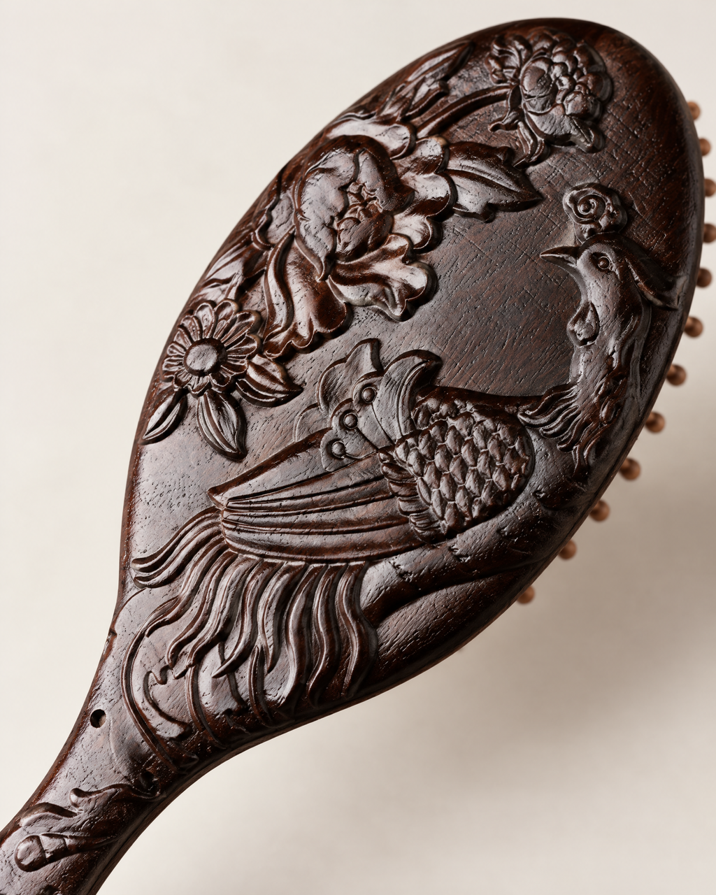 The Aviary Brush, carved bird detail