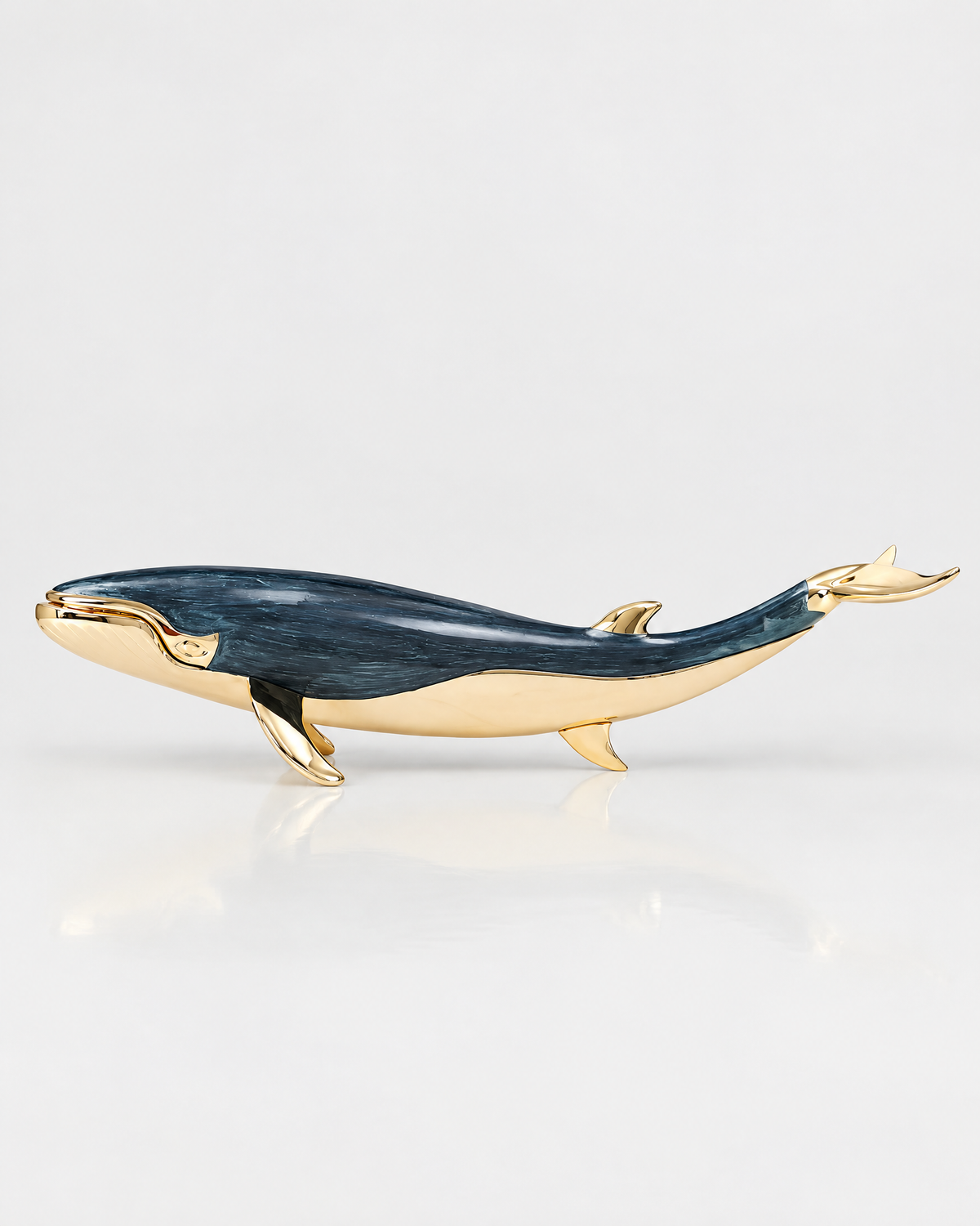 The Nantucket Whale in midnight blue enamel and gold-tone metal