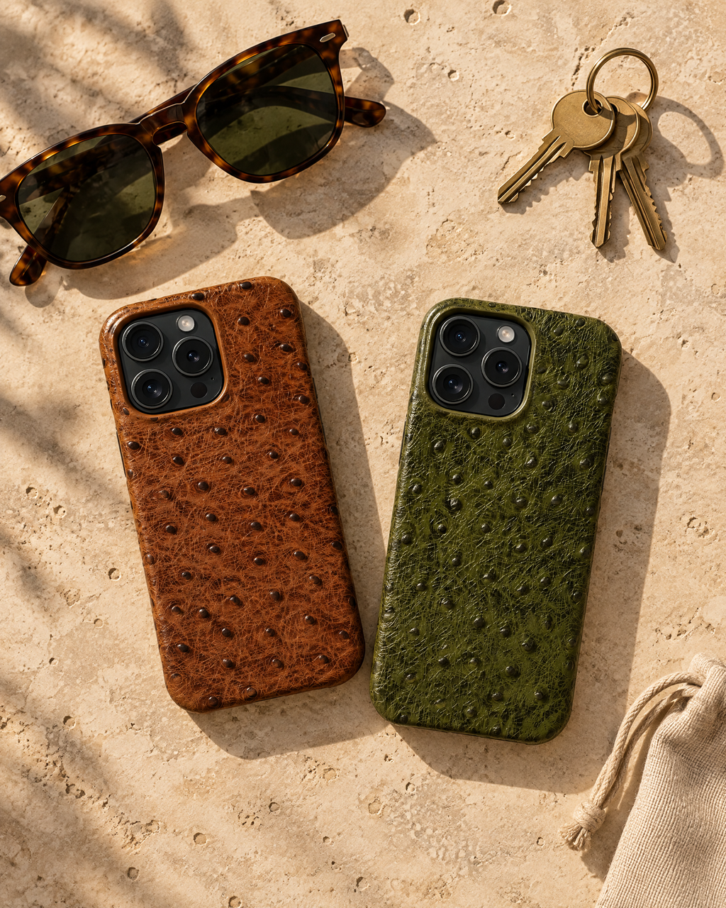 The Safari Phone Case in cognac brown and olive green on travertine