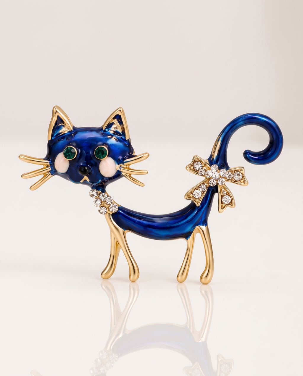 The Midnight Cat Brooch standing with a soft reflection