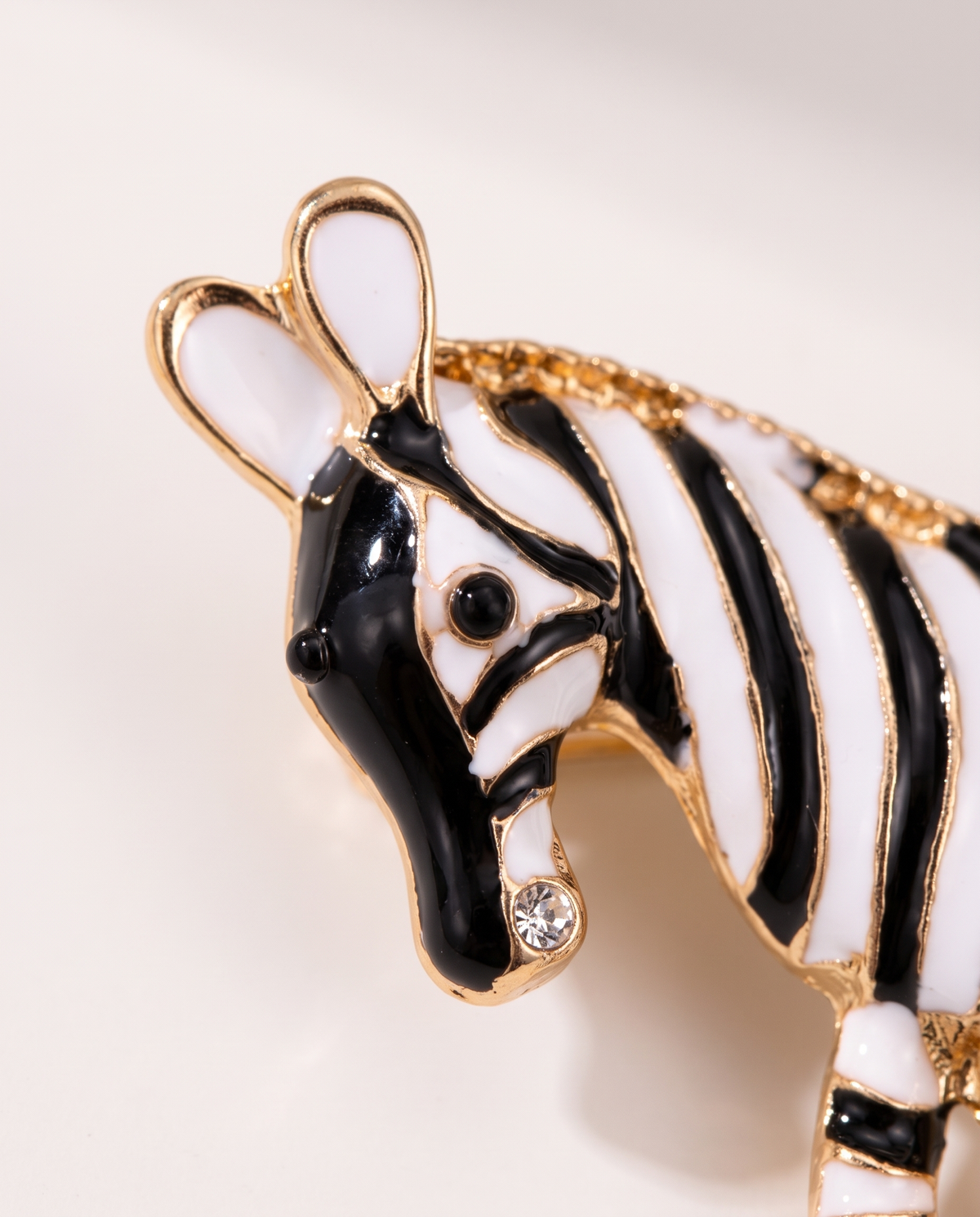 Close up of the zebra head with rhinestone at the muzzle