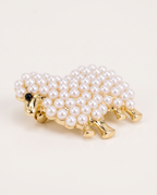 The Pearl Lamb Brooch from a low angle