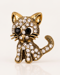 The Diamante Cat Brooch in antique gold with clear rhinestones