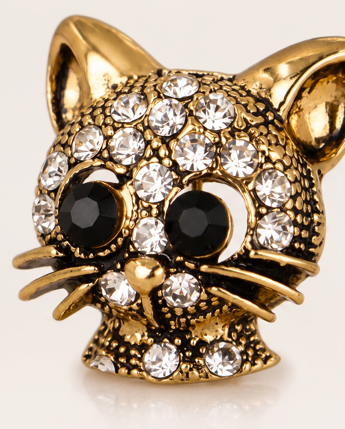 Close up of the black crystal eyes and rhinestones