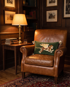 The Sporting Club Cushion on a leather armchair