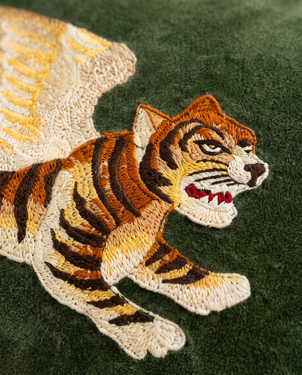 Close up of the winged tiger embroidery