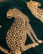 Close up of a gold cheetah print on velvet