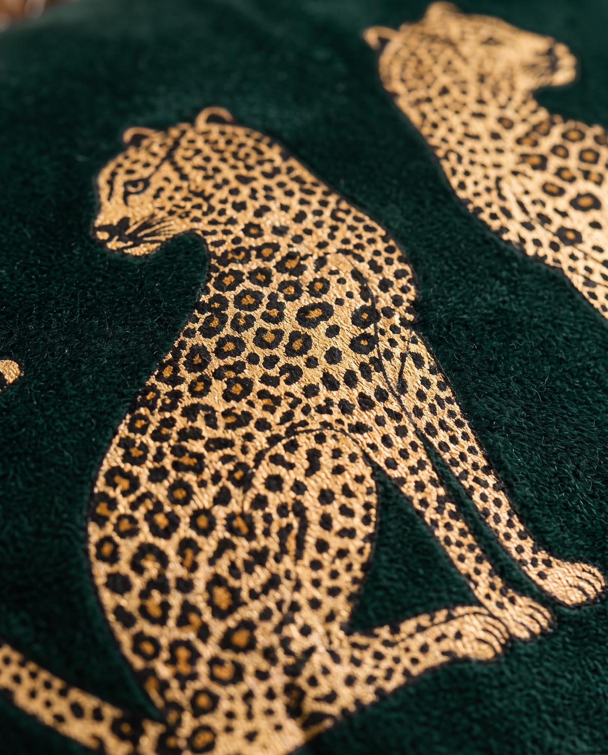 Close up of a gold cheetah print on velvet