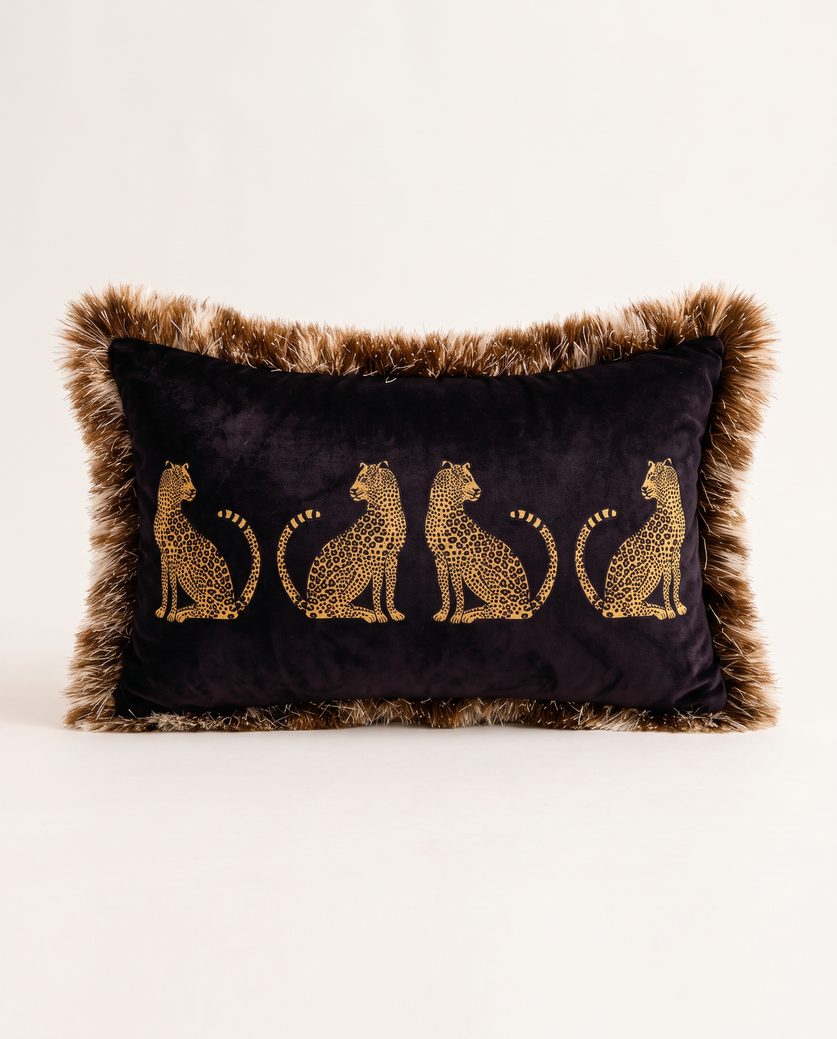 The Cheetah Parade Cushion in black velvet