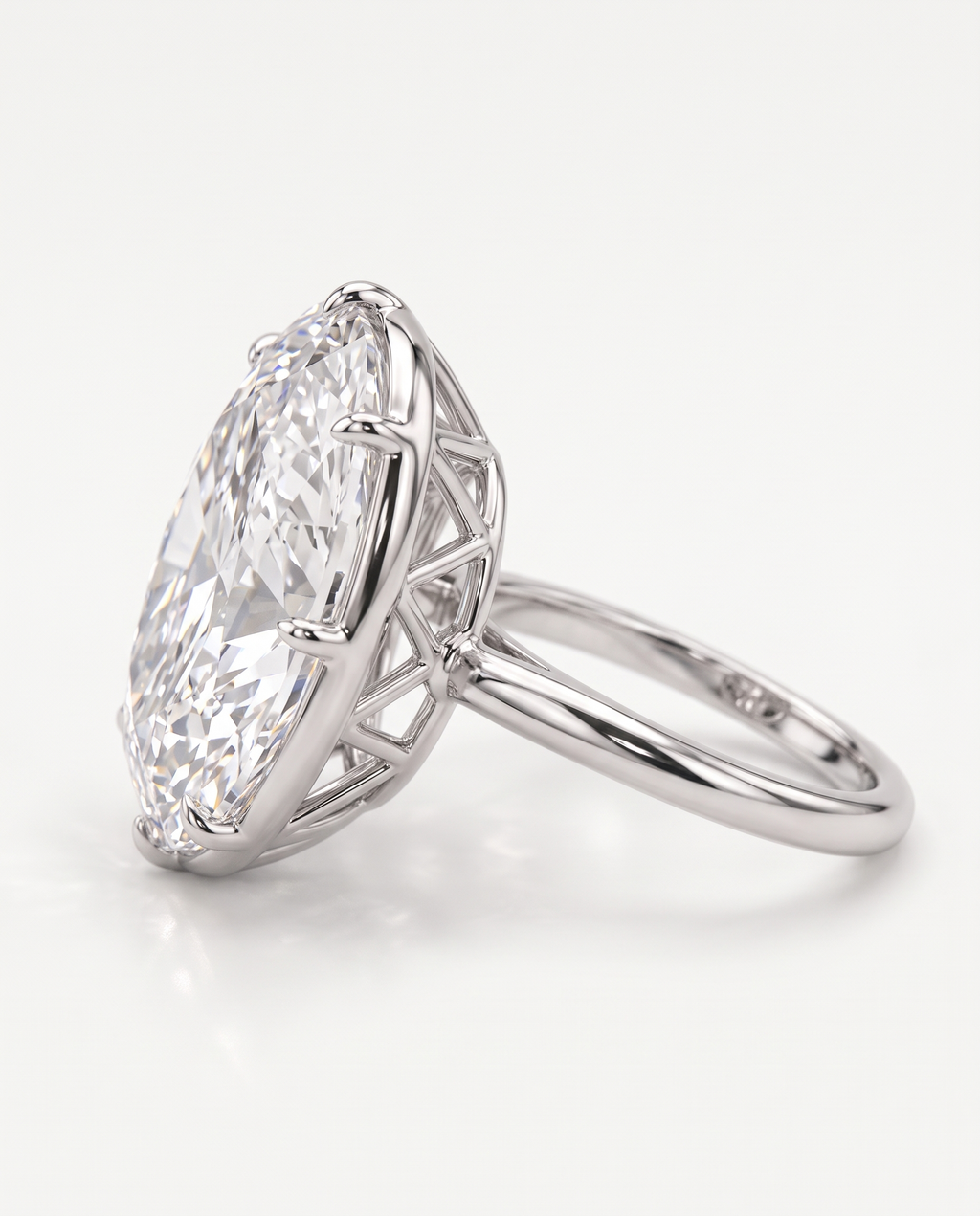 Side view of The Duchess Ring showing the open claw setting beneath the oval stone