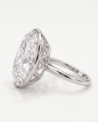 Side view of The Duchess Ring showing the open claw setting beneath the oval stone