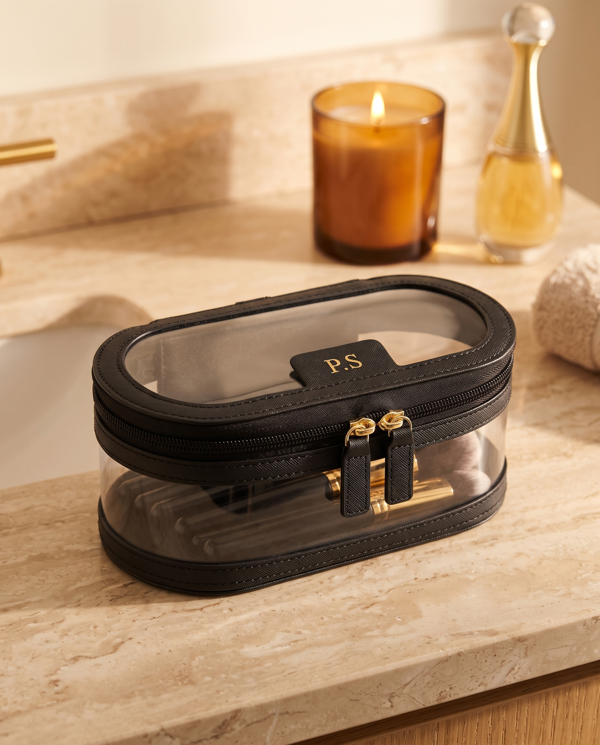 Monaco Brush Case in black on a marble vanity with a candle