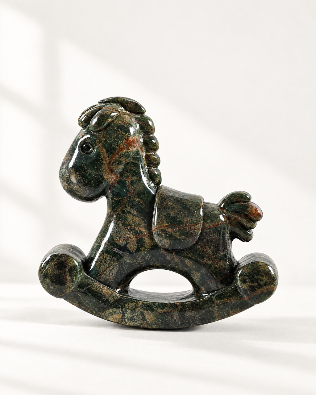 The Ascot Rocking Horse in Verde Alpi green marble