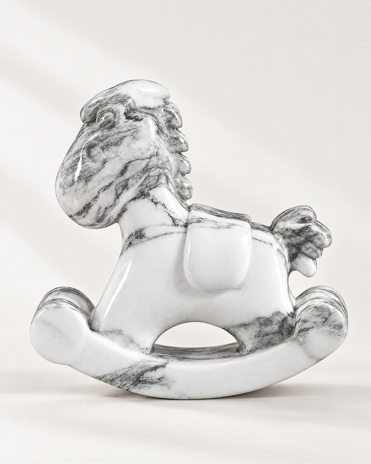 The Ascot Rocking Horse in Arabescato Corchia white marble