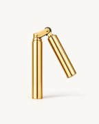 The Piccadilly Lighter in gold, swung open