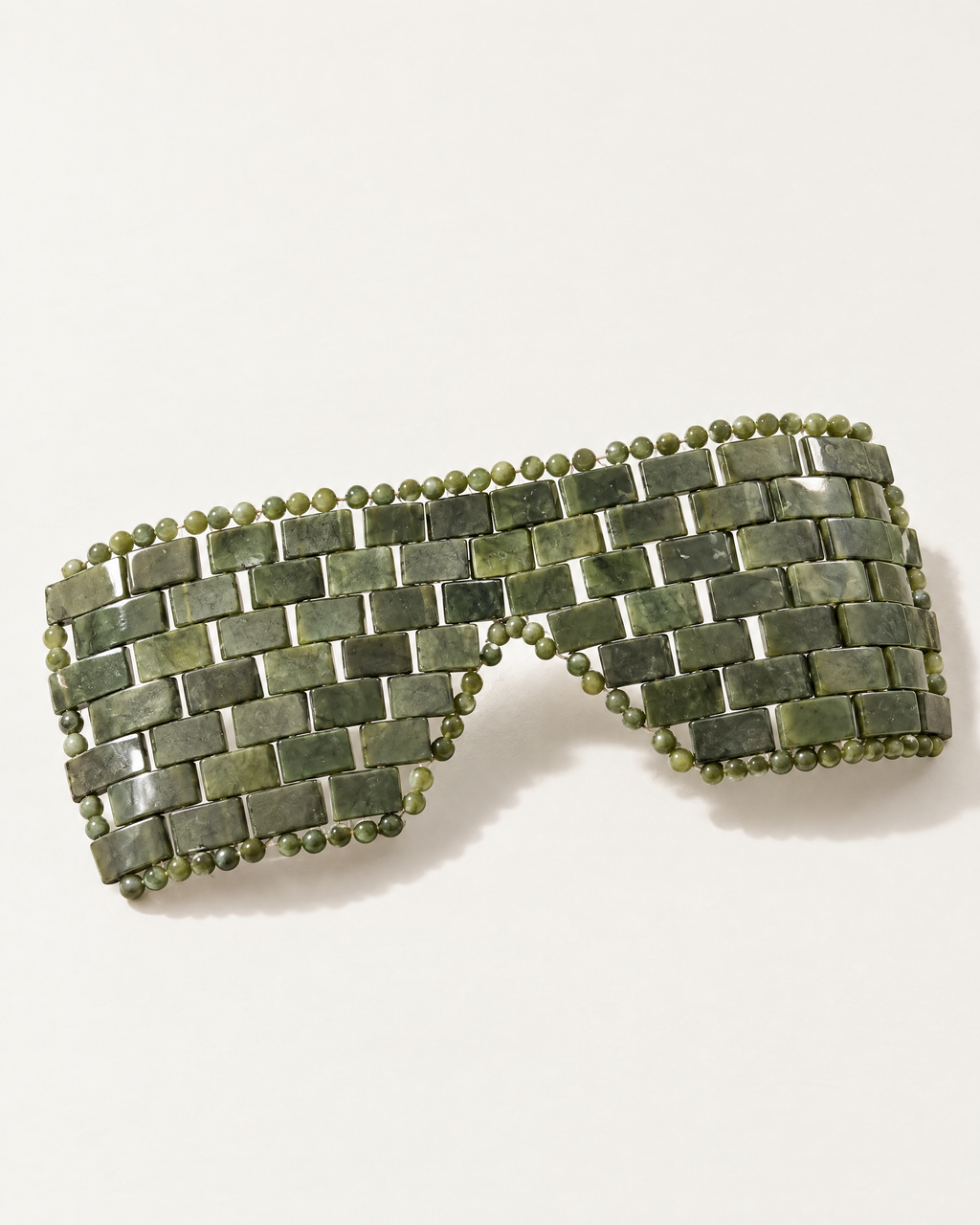 The Suzhou Jade Eye Mask in green jade stone tiles