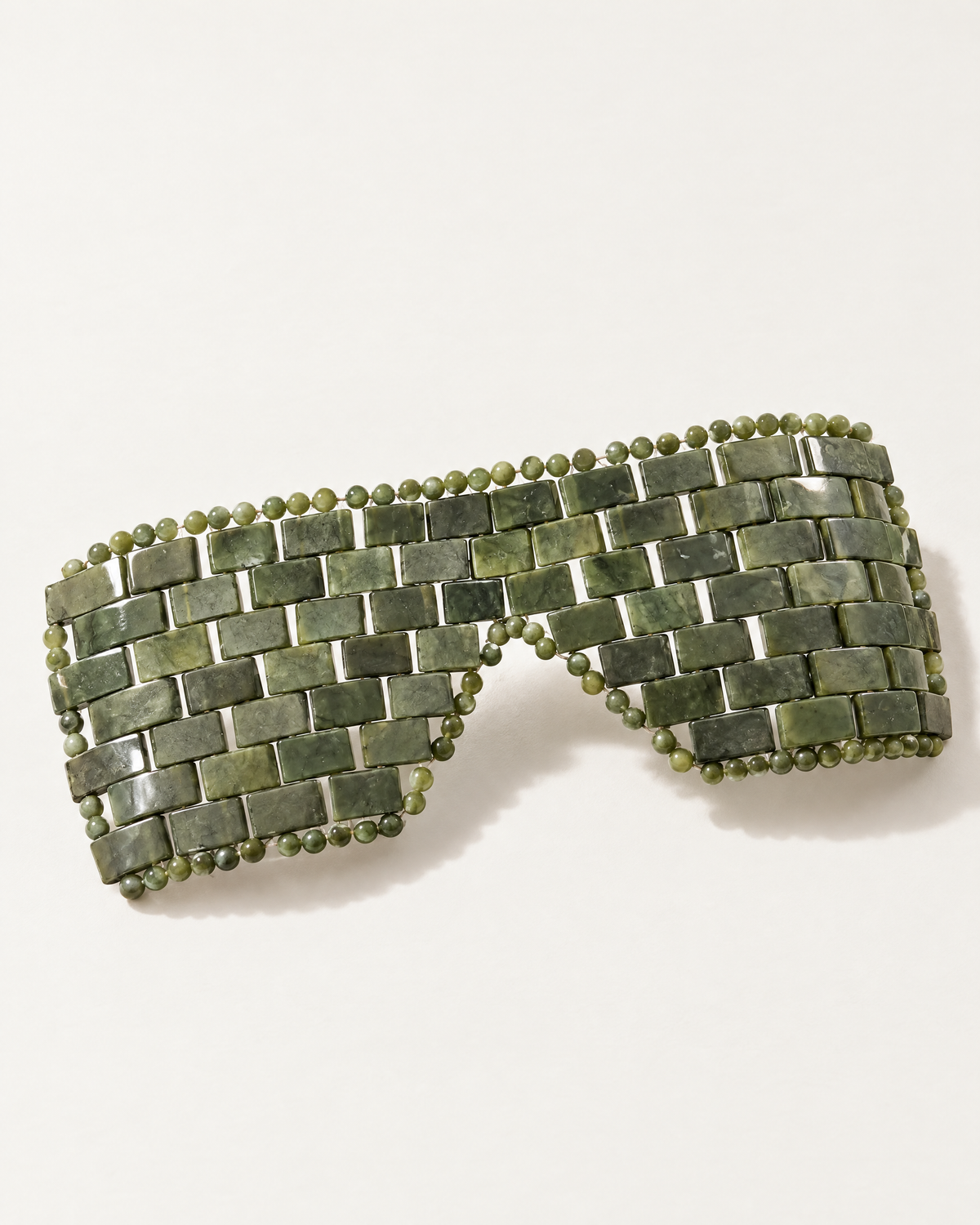 The Suzhou Jade Eye Mask in green jade stone tiles