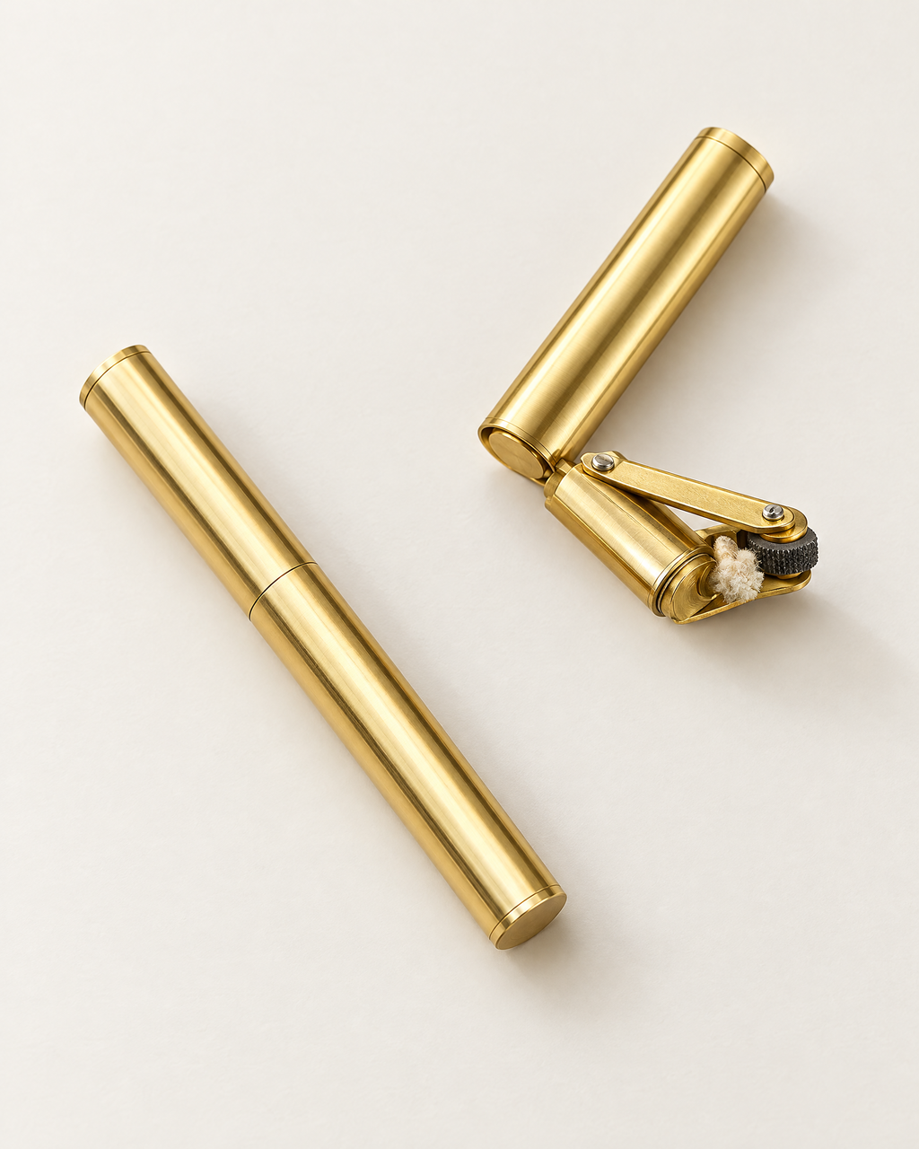 The Piccadilly Lighter in gold brass, closed and open