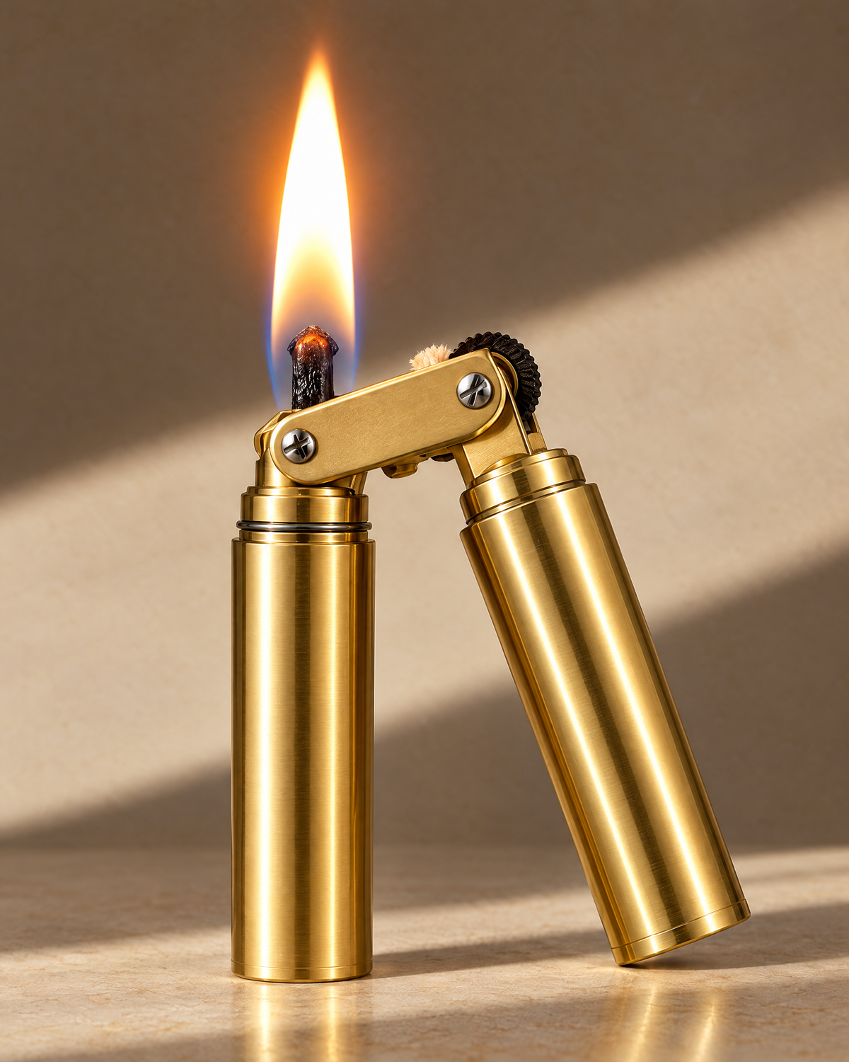 The Piccadilly Lighter in gold, open and lit