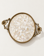 The Positano Tray in Shell mother of pearl with beaded brass rim and flower handles