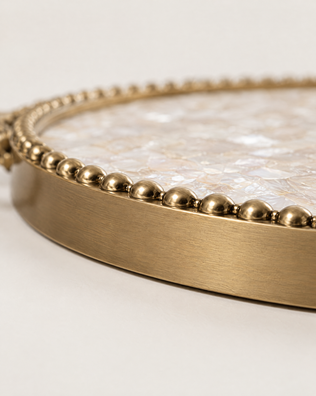 The Positano Tray beaded brass rim detail