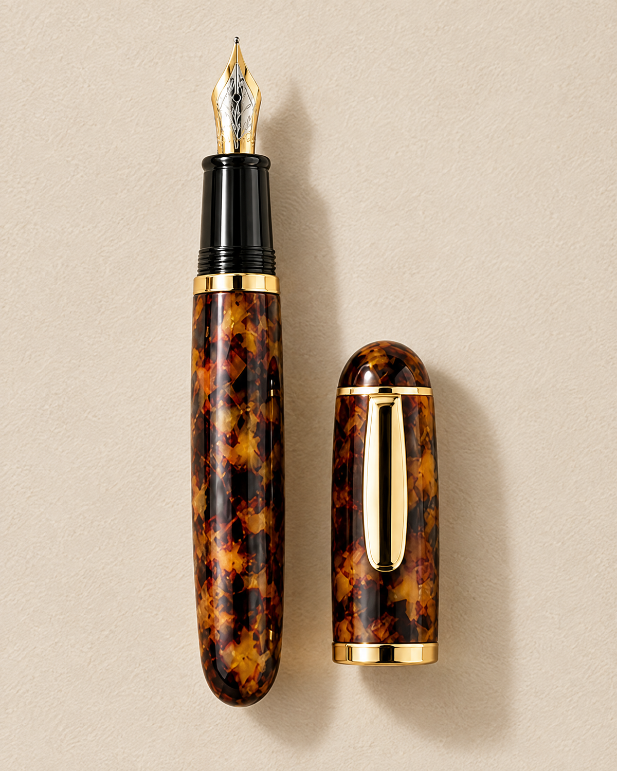 The Bloomsbury Pocket Pen uncapped beside its cap